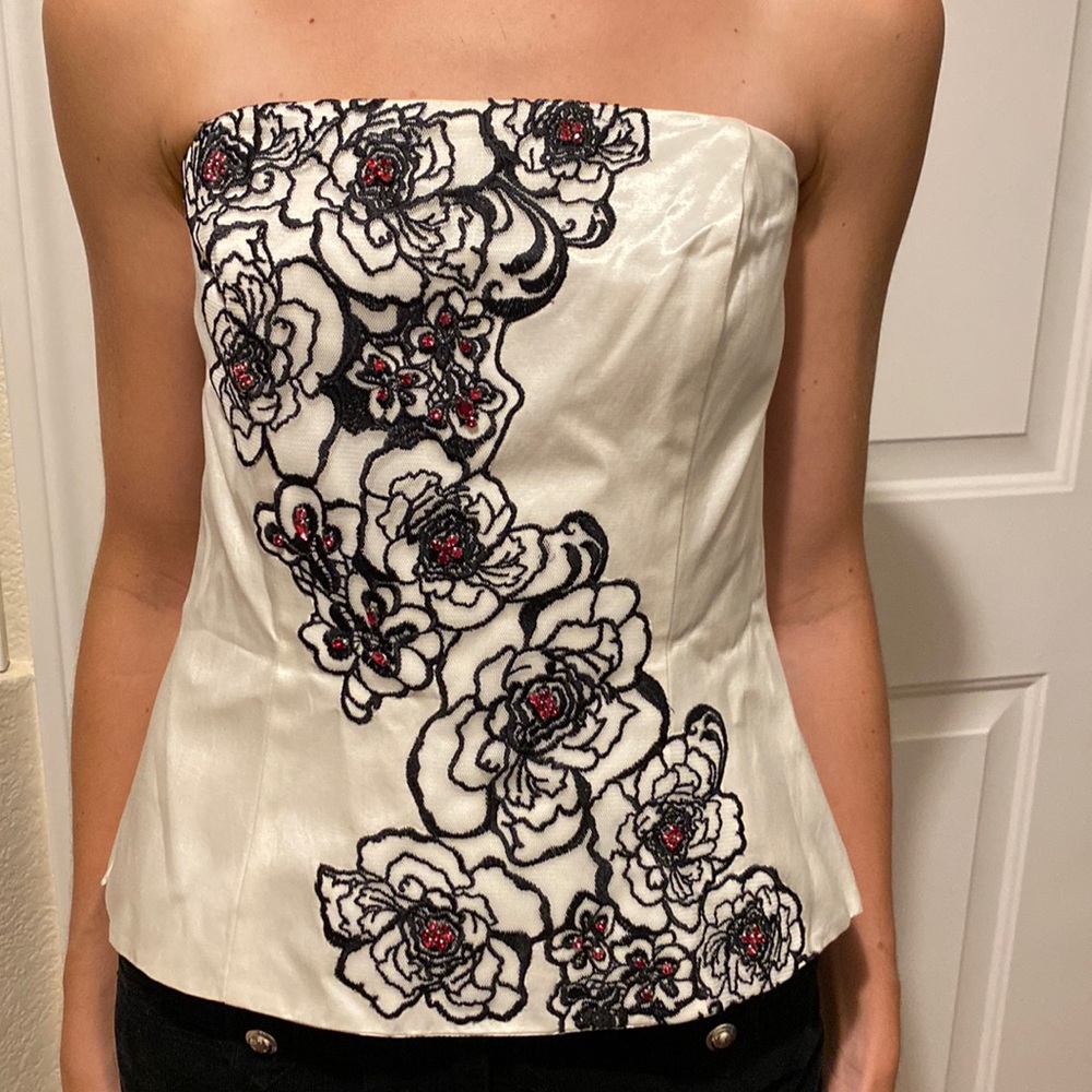 White, Black and Red corset top with floral print.